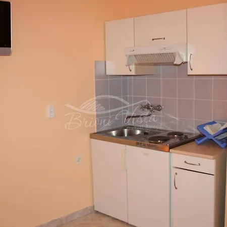 With Free Parking And No Balcony But Terase In Front Of The House *